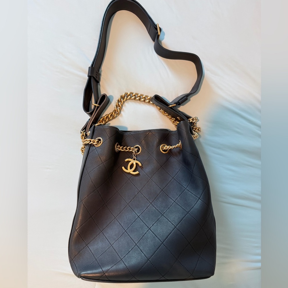 CHANEL Black Quilted Drawstring Shoulder Bag with Gold Hardware
